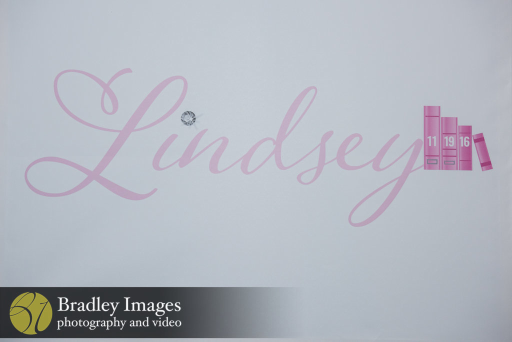 Logo at Lindsey's pink book themed Bat Mitzvah party at DoubleTree Bethesda | Pop Color Events | Adding a Pop of Color to Bar & Bat Mitzvahs in DC, MD & VA | Photo by Bradley Images