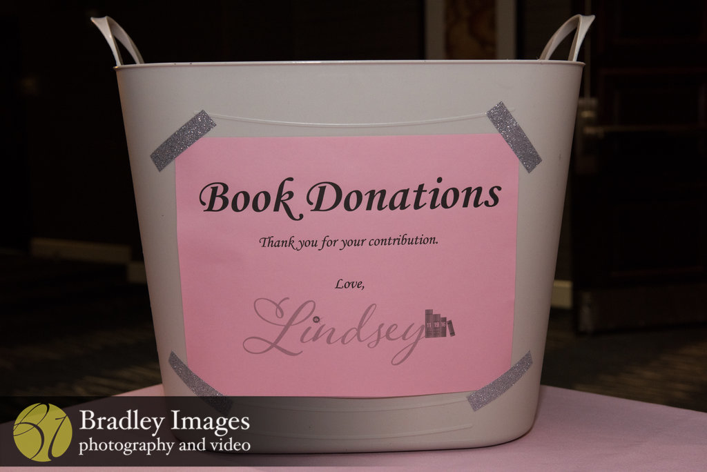 Book donations Mitzvah project at Lindsey's pink book themed Bat Mitzvah party at DoubleTree Bethesda | Pop Color Events | Adding a Pop of Color to Bar & Bat Mitzvahs in DC, MD & VA | Photo by Bradley Images