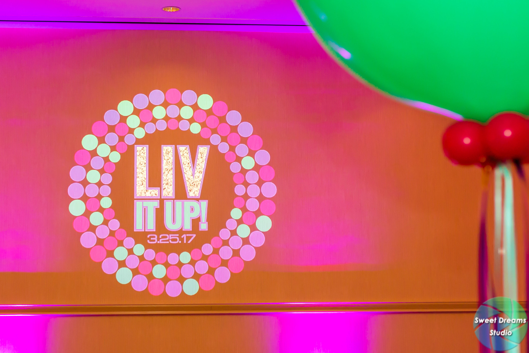 Liv it Up logo at Olivia's colorful, jewel-toned, balloon-filled Bat Mitzvah party at Hyatt Regency Dulles. Pink, purple, teal, turquoise and gold. | Pop Color Events | Adding a pop of color to Bar & Bat Mitzvahs in DC, MD & VA | Photo by Sweet Dreams Studios