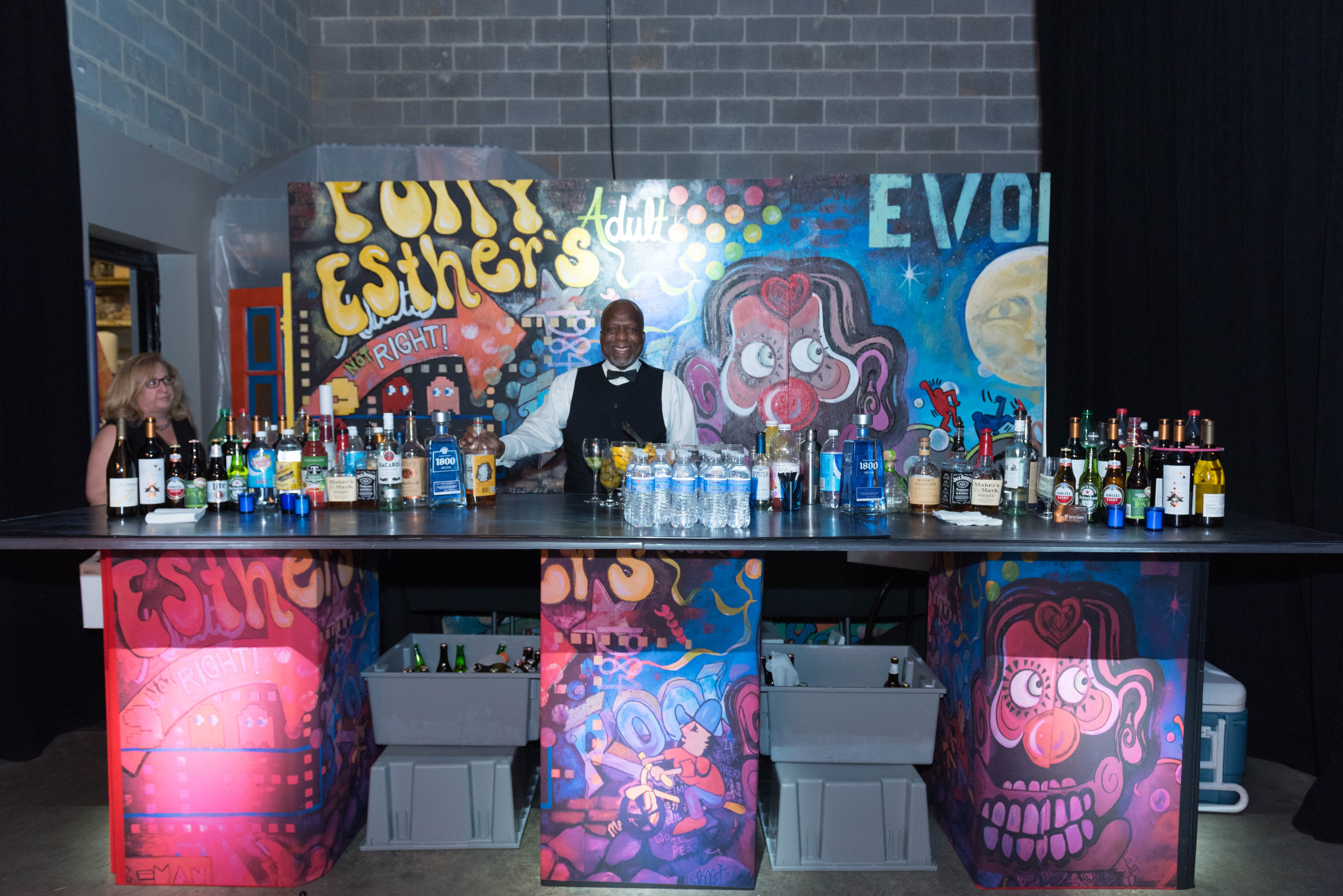 Graffiti Bar at a midnight blue and lavender urban lounge and club-themed B'nai Mitzvah party for twins in Beltsville, Maryland | Pop Color Events | Adding a Pop of Color to Bar and Bat Mitzvahs in DC, MD & VA