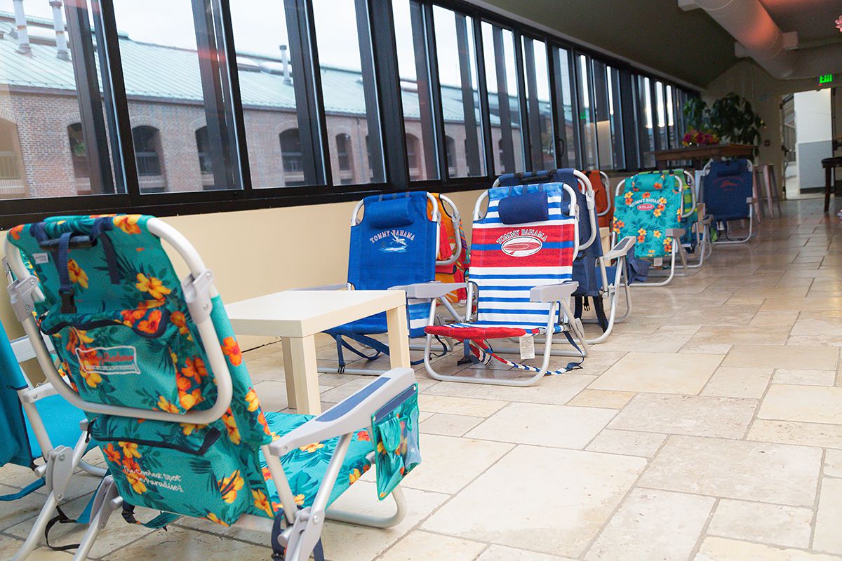 Beach chair lounge seating at Lily's Pinstripes Georgetown DC Luau Bat Mitzvah Party | Pop Color Events | Adding a pop of color to Bar & Bat Mitzvahs in DC, MD & VA | Photo by Powell Woulfe Photography
