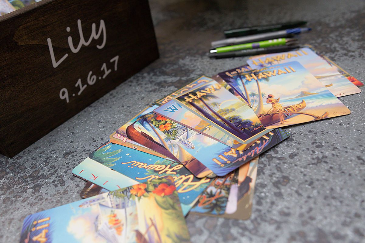 Hawaiian Sign in post cards at Lily's Pinstripes Georgetown DC Luau Bat Mitzvah Party | Pop Color Events | Adding a pop of color to Bar & Bat Mitzvahs in DC, MD & VA | Photo by Powell Woulfe Photography