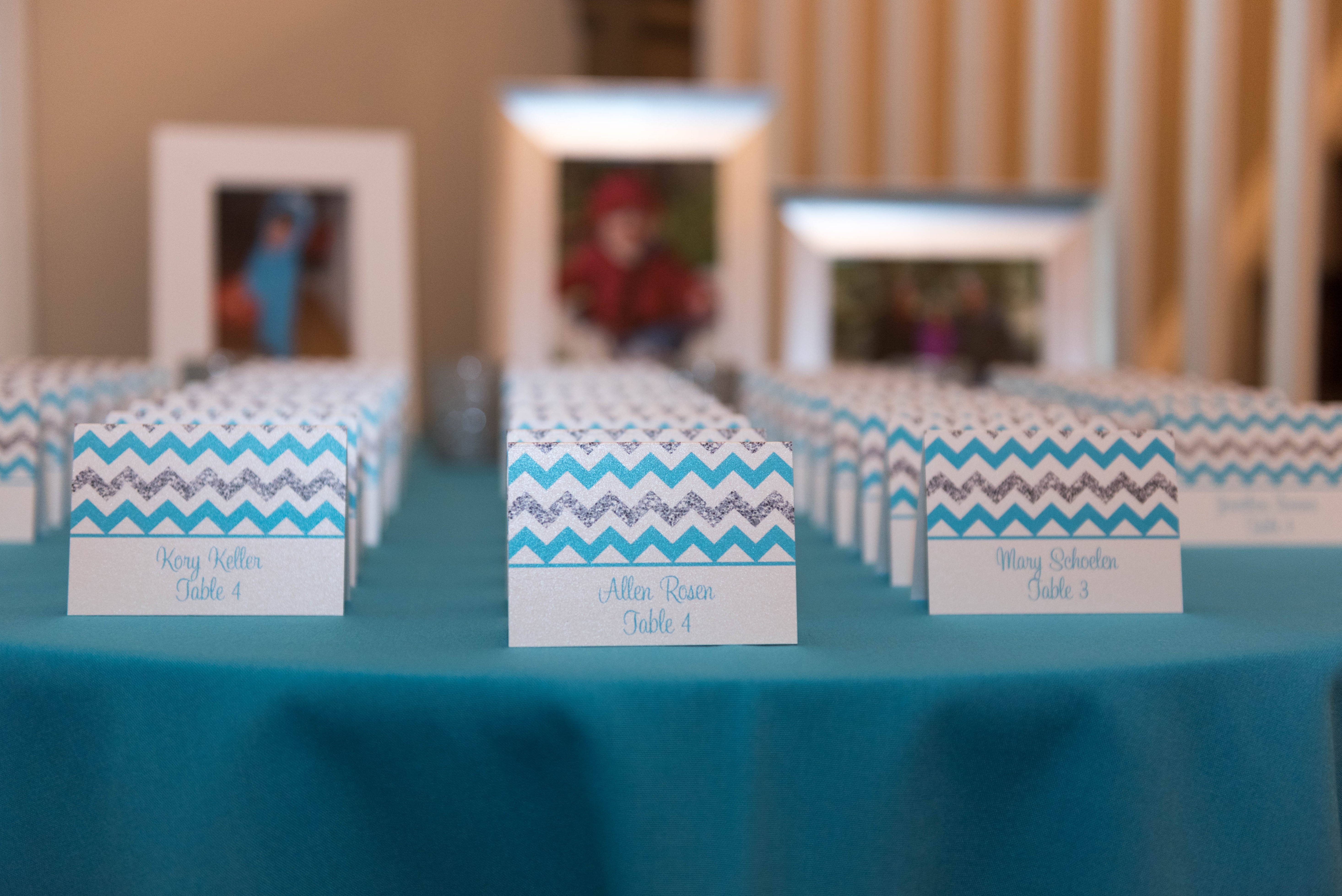 Adult escort cards and picture frames at Shoshana's blue and silver sparkle Bat Mitzvah party at Rock Creek Mansion in Bethesda. | Pop Color Events | Adding a Pop of Color to Bar & Bat Mitzvahs in MD, DC & VA. | Photo by A La Mode Photography