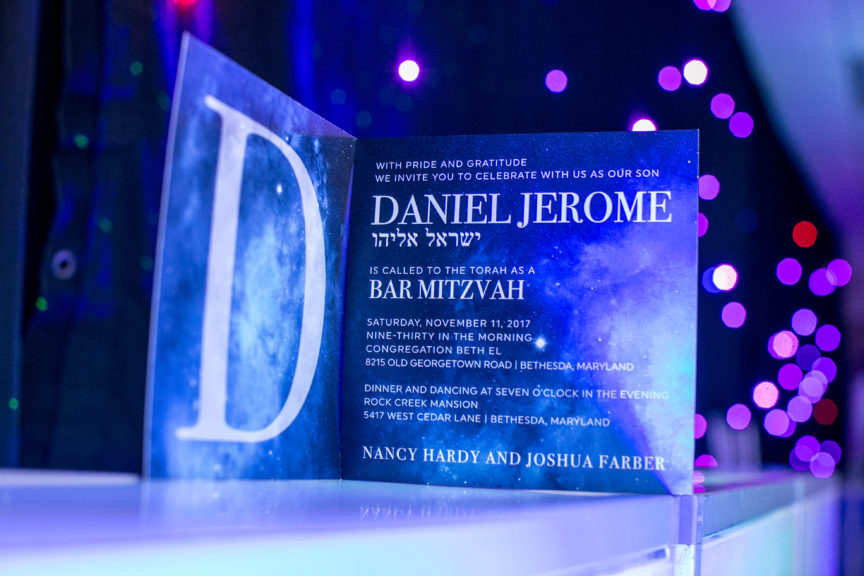 Event Prints Invitation at Daniel's Outer Space Bar Mitzvah Party at Rock Creek Mansion in Bethesda, MD | Pop Color Events | Adding a Pop of Color to Bar & Bat Mitzvahs in DC, MD & VA | Photo Credit: Michael Temchine Photography