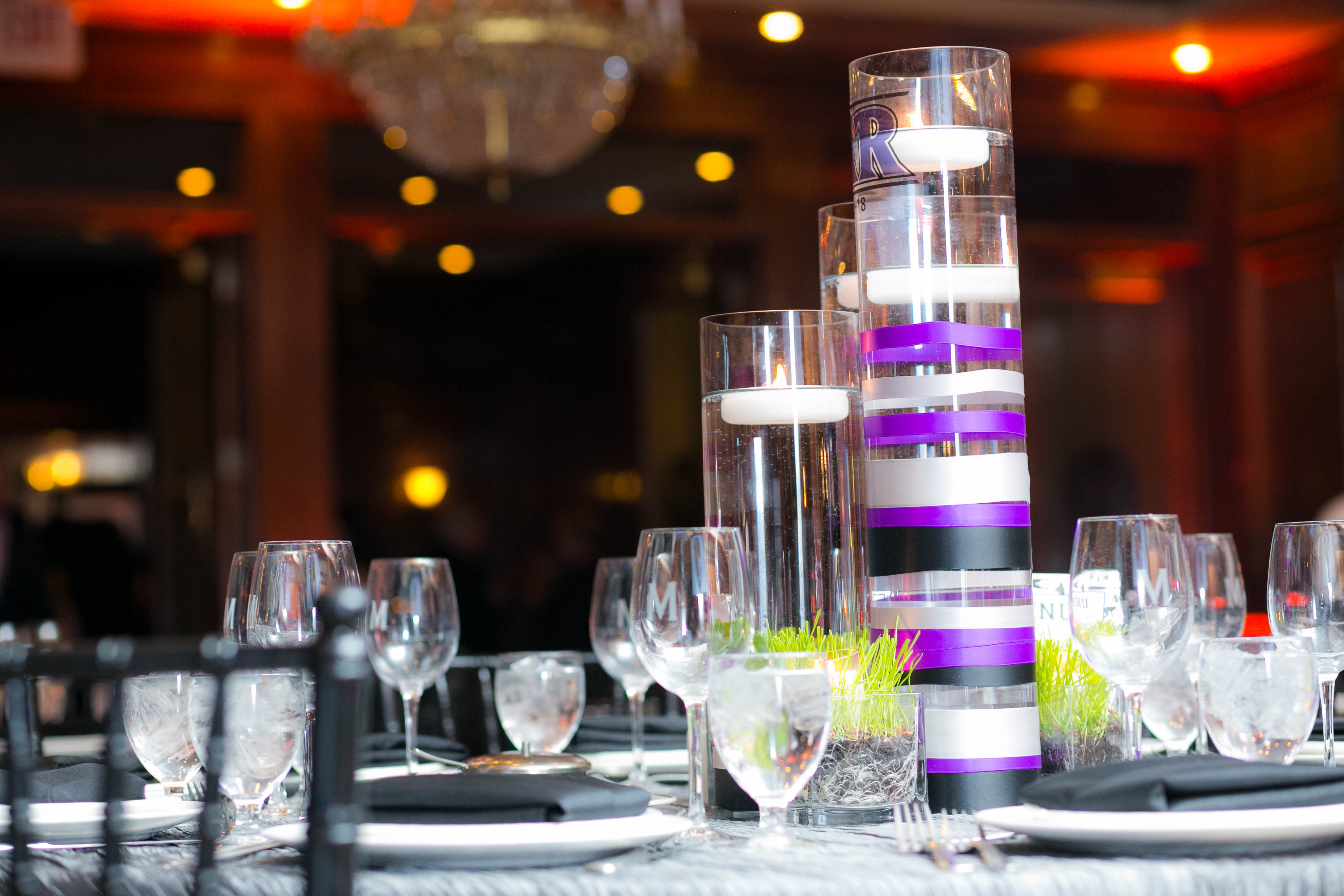 Floating Candle Centerpieces at Ravens Bar Mitzvah Party at Maggiano's Chevy Chase | Pop Color Events | Adding a Pop of Color to Bar & Bat Mitzvahs in DC, MD & VA | Photo by Michael Temchine Photography