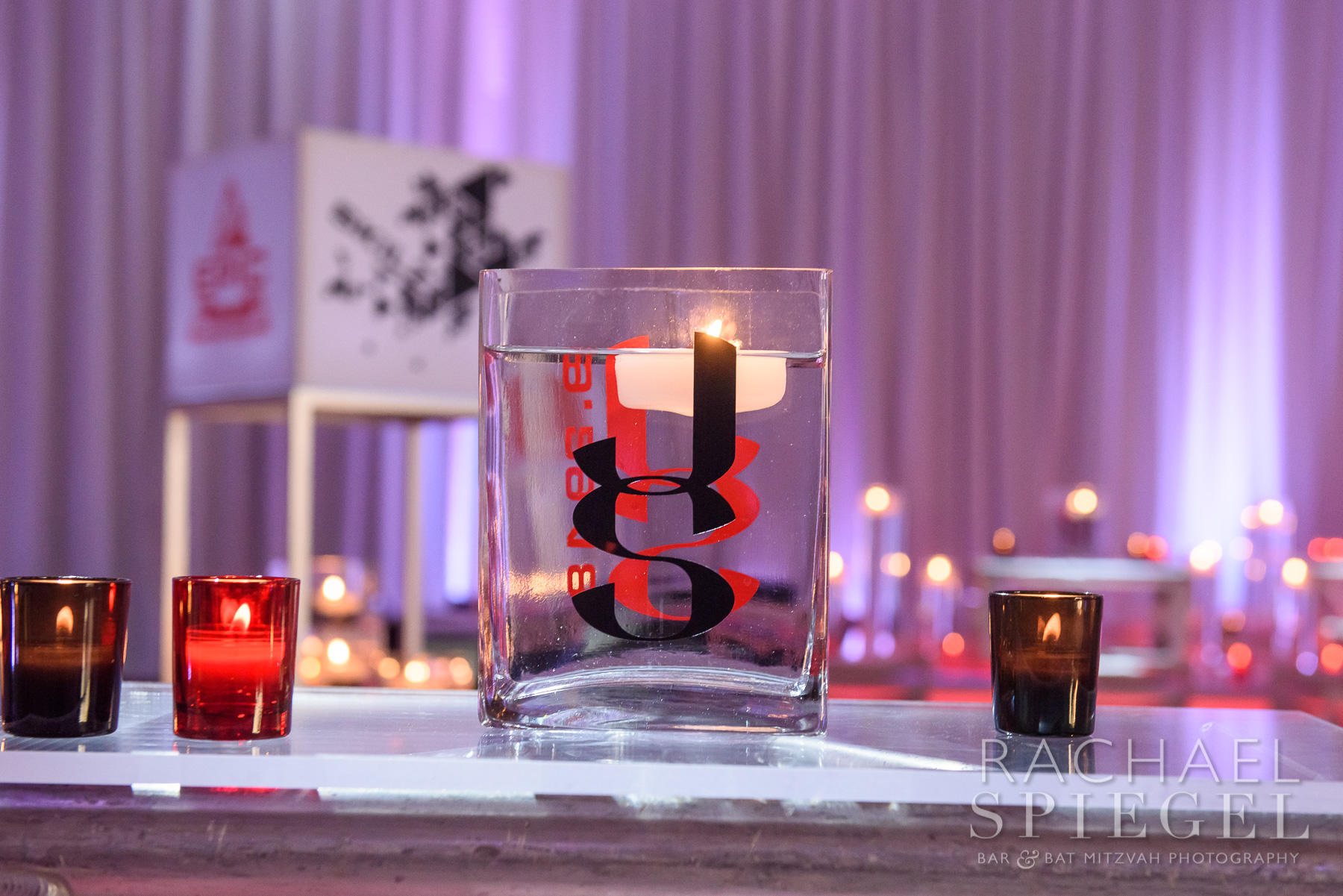 Floating candles at Four Seasons Baltimore | Pop Color Events | Adding a Pop of Color to Bar & Bat Mitzvahs in DC, MD & VA | Photo by Rachael Spiegel Photography