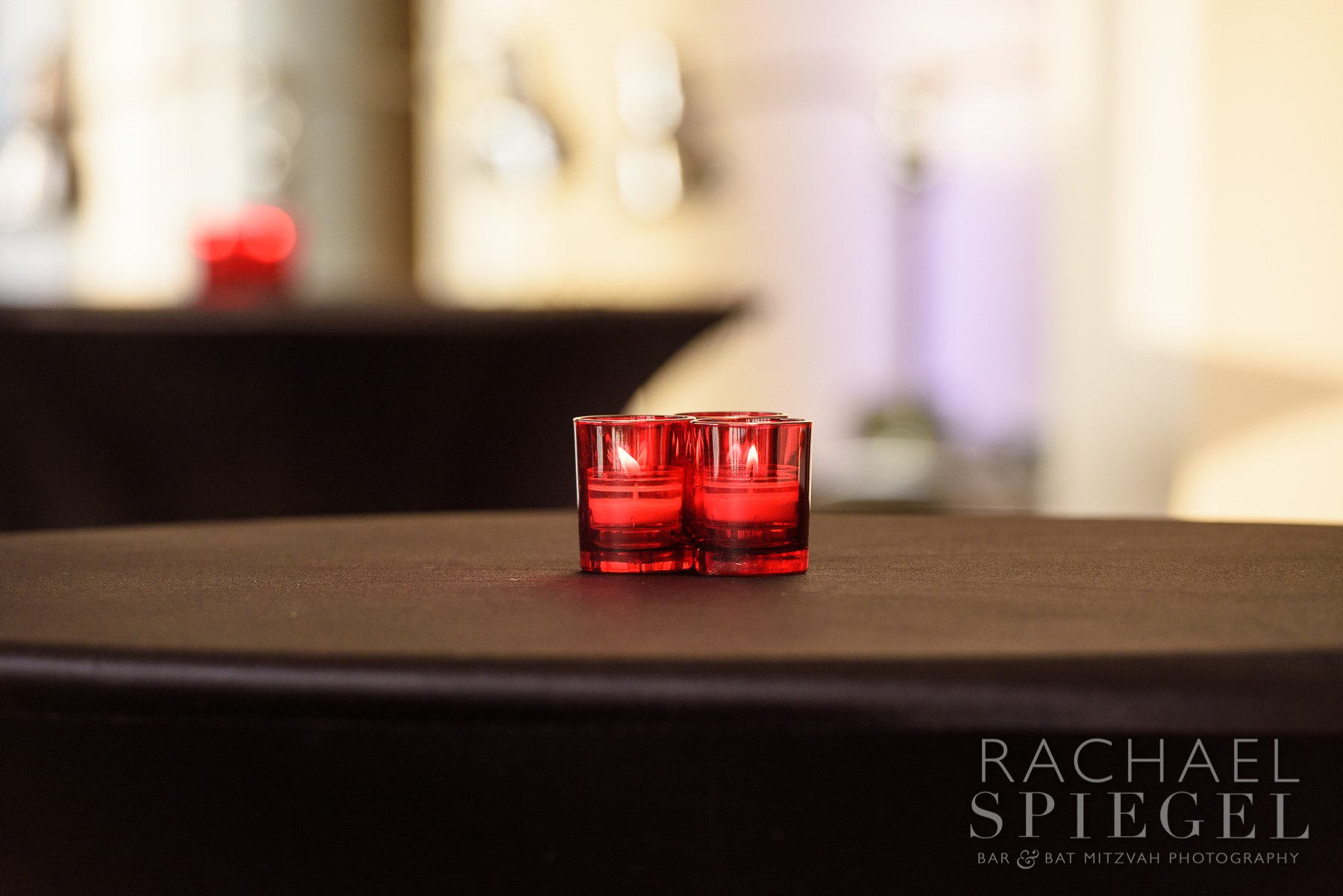 Votive candles at Four Seasons Baltimore | Pop Color Events | Adding a Pop of Color to Bar & Bat Mitzvahs in DC, MD & VA | Photo by Rachael Spiegel Photography
