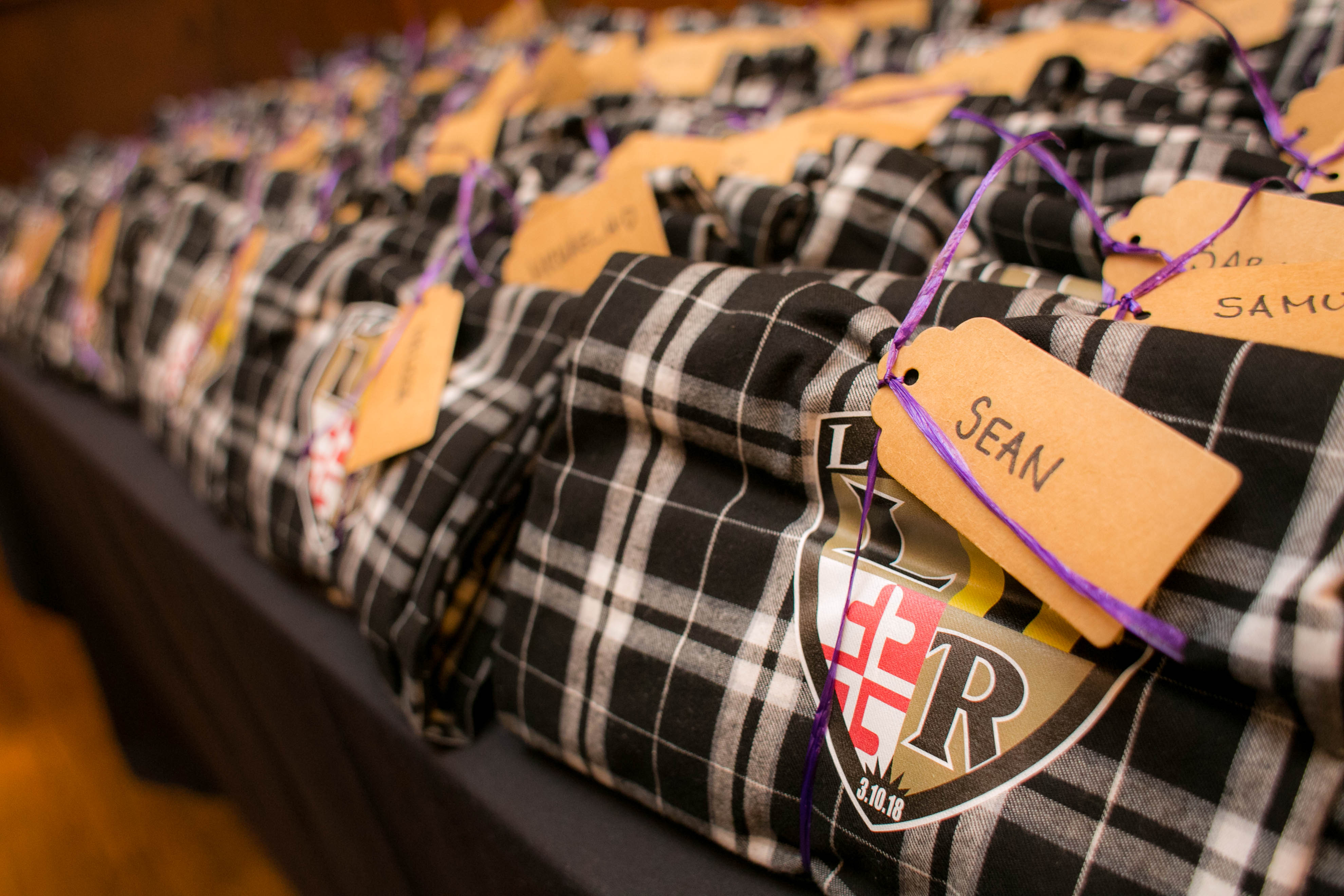 PJs favors at Ravens Bar Mitzvah Party at Maggiano's Chevy Chase | Pop Color Events | Adding a Pop of Color to Bar & Bat Mitzvahs in DC, MD & VA | Photo by Michael Temchine Photography