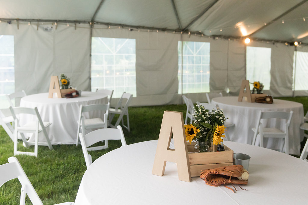Tent centerpieces Alec's Cubs Baseball-themed Bar Mitzvah Party at Rocklands Farm in Poolesville, MD | Pop Color Events | Adding a Pop of Color to Bar and Bat Mitzvahs in DC, MD and VA | Photo by Jason Weil Photography