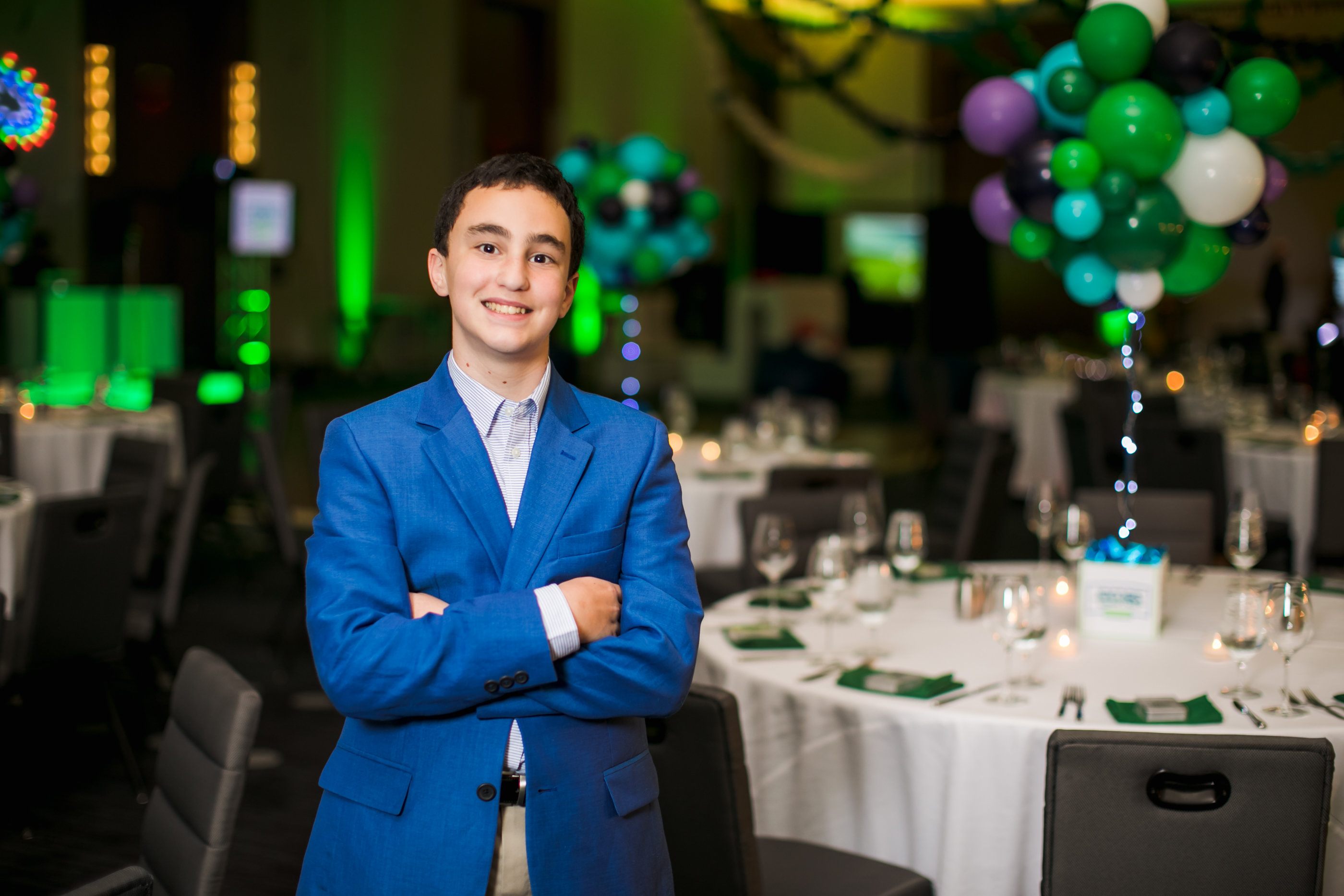 James's Games-themed Bar Mitzvah party at Hyatt Regency Tysons Corner with balloons, arcade games and playing cards in Northern Virginia. | Pop Color Events | Adding a Pop of Color to Bar & Bat Mitzvahs in DC, MD & VA | Photo by Bradley Images