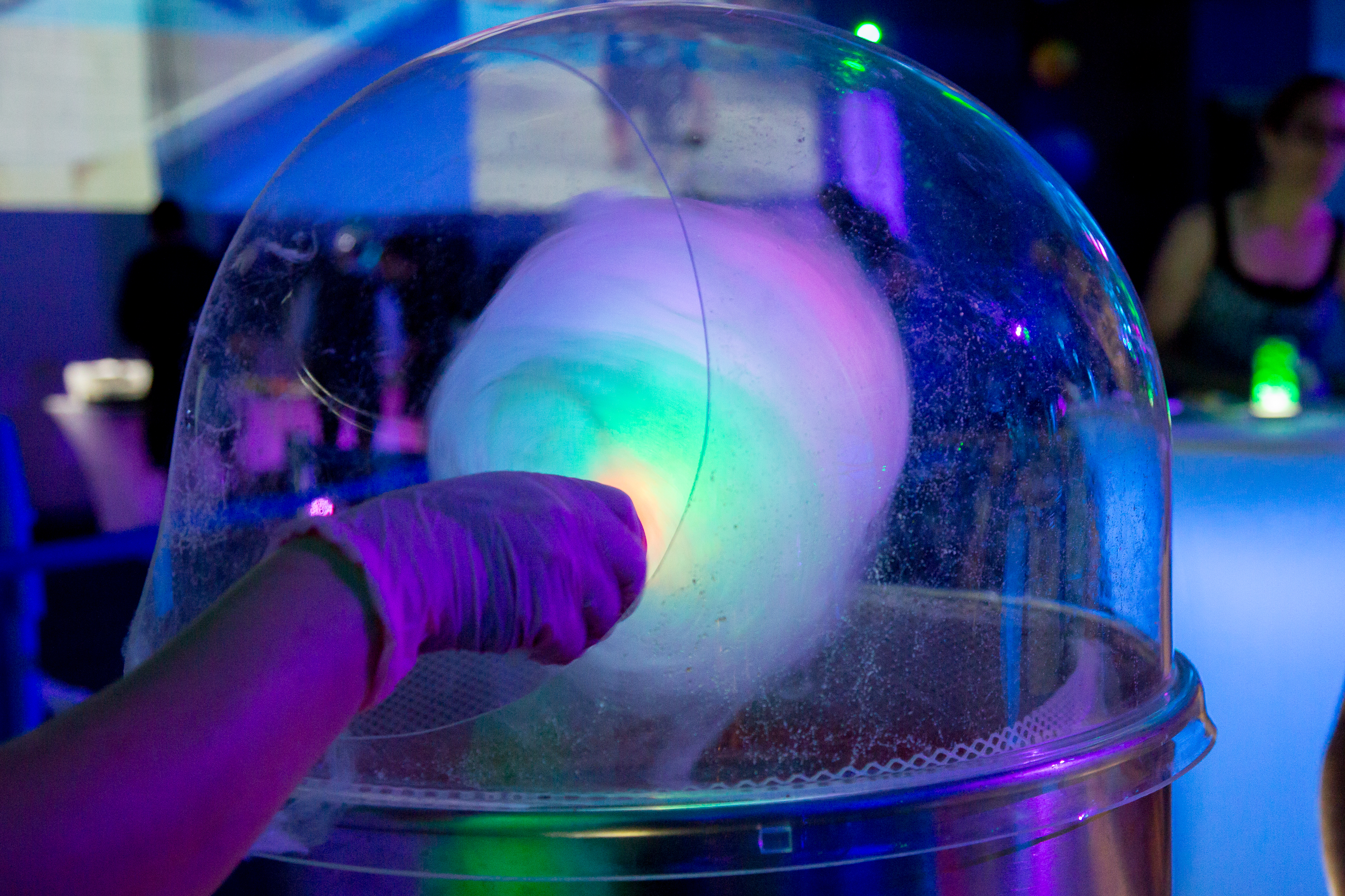 Fluffness glowing cotton candy | AvaZone Magical Whimsical Fantasy themed Bat Mitzvah party with bears, lighting, lounge furniture, cotton candy, unicorn tables and more at ZavaZone in Sterling VA | Photography by Jessica Latos Photography