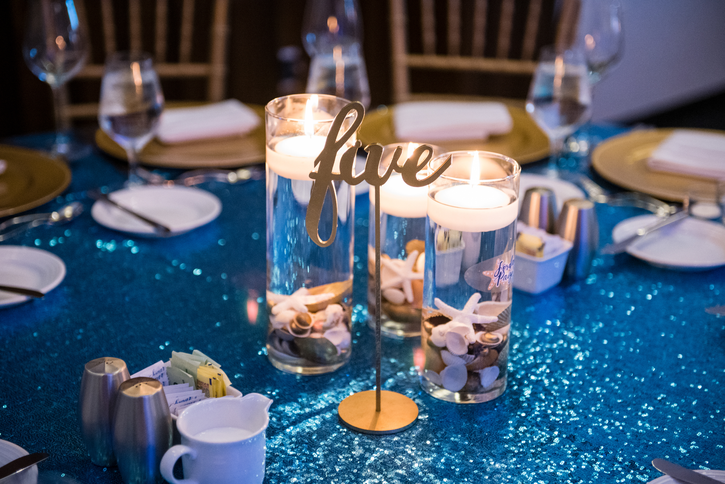 Shell centerpieces at Jordan's Sparkling Beach Bat Mitzvah at Hyatt Regency Tysons Corner Center Virginia | Pop Color Events | Adding a Pop of Color to Bar & Bat Mitzvahs in DC, MD & VA | Photo by: Lacey Ann Photography
