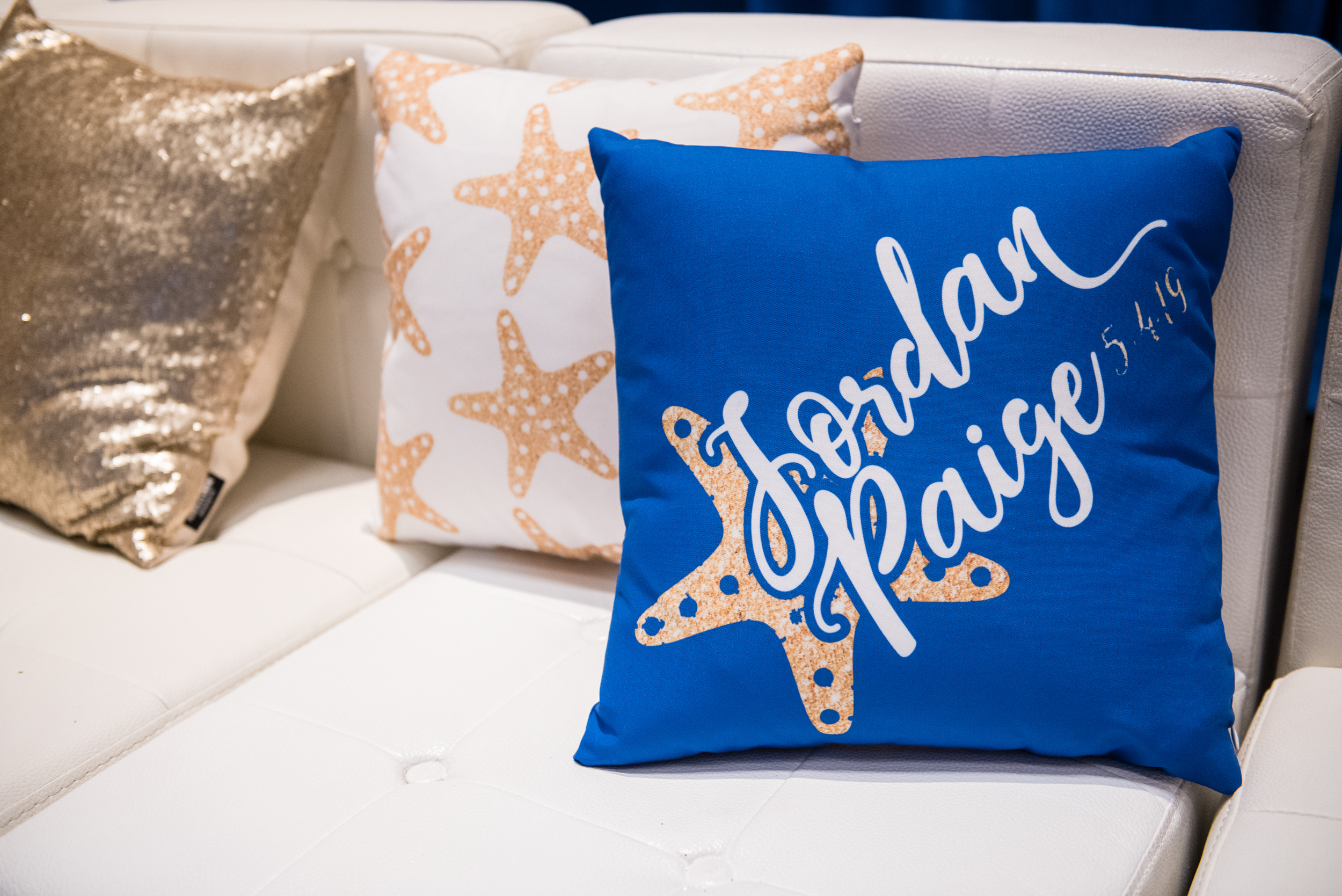 Logoed pillows at Jordan's Sparkling Beach Bat Mitzvah at Hyatt Regency Tysons Corner Center Virginia | Pop Color Events | Adding a Pop of Color to Bar & Bat Mitzvahs in DC, MD & VA | Photo by: Lacey Ann Photography