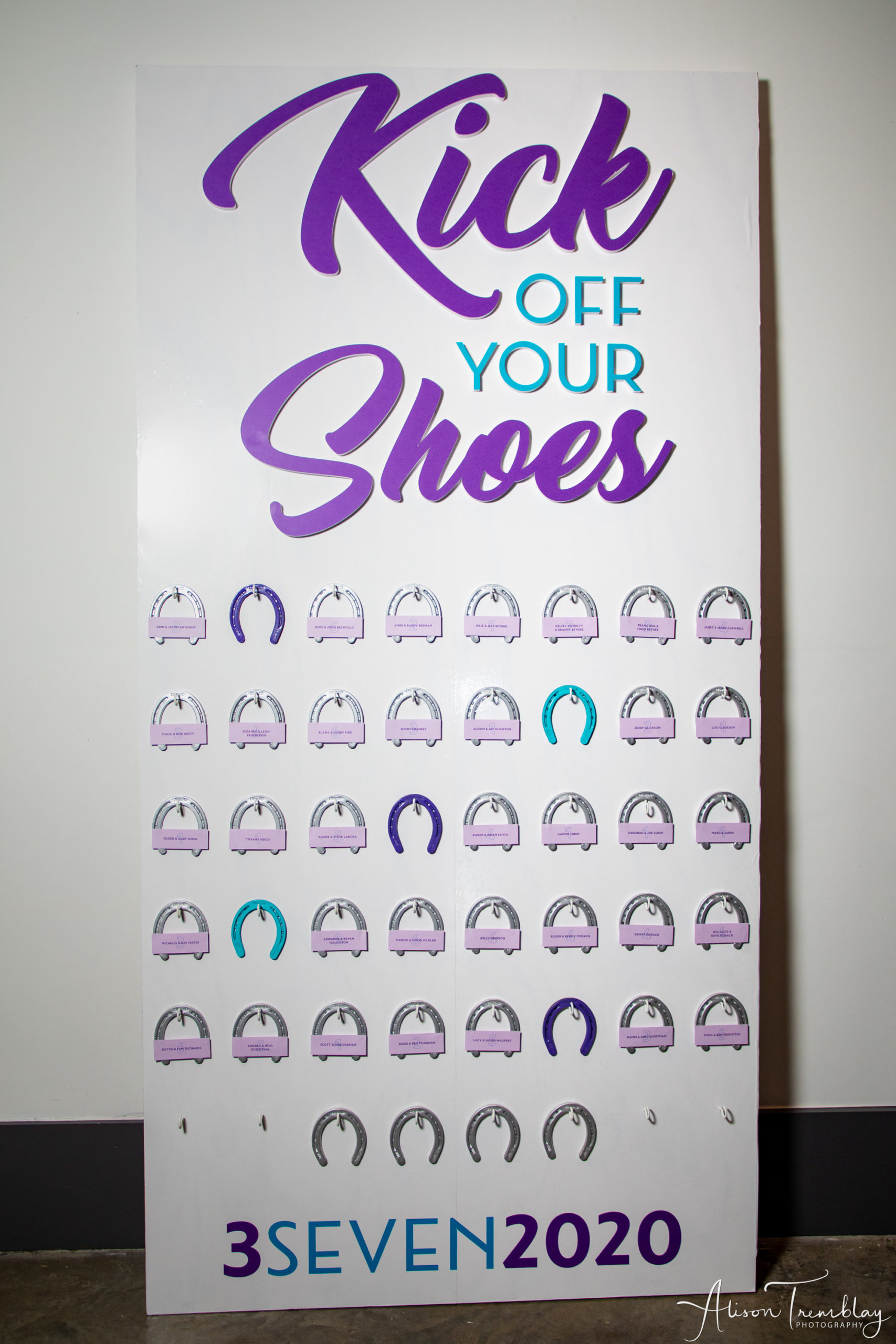 Horse shoe escort card wall at Zoe's Purple and Teal Equestrian Bat Mitzvah at Canopy by Hilton Washington DC Bethesda North | Pop Color Events | Adding a Pop of Color to Bar & Bat Mitzvahs in DC, MD & VA | Photo by: Alison Tremblay Photography