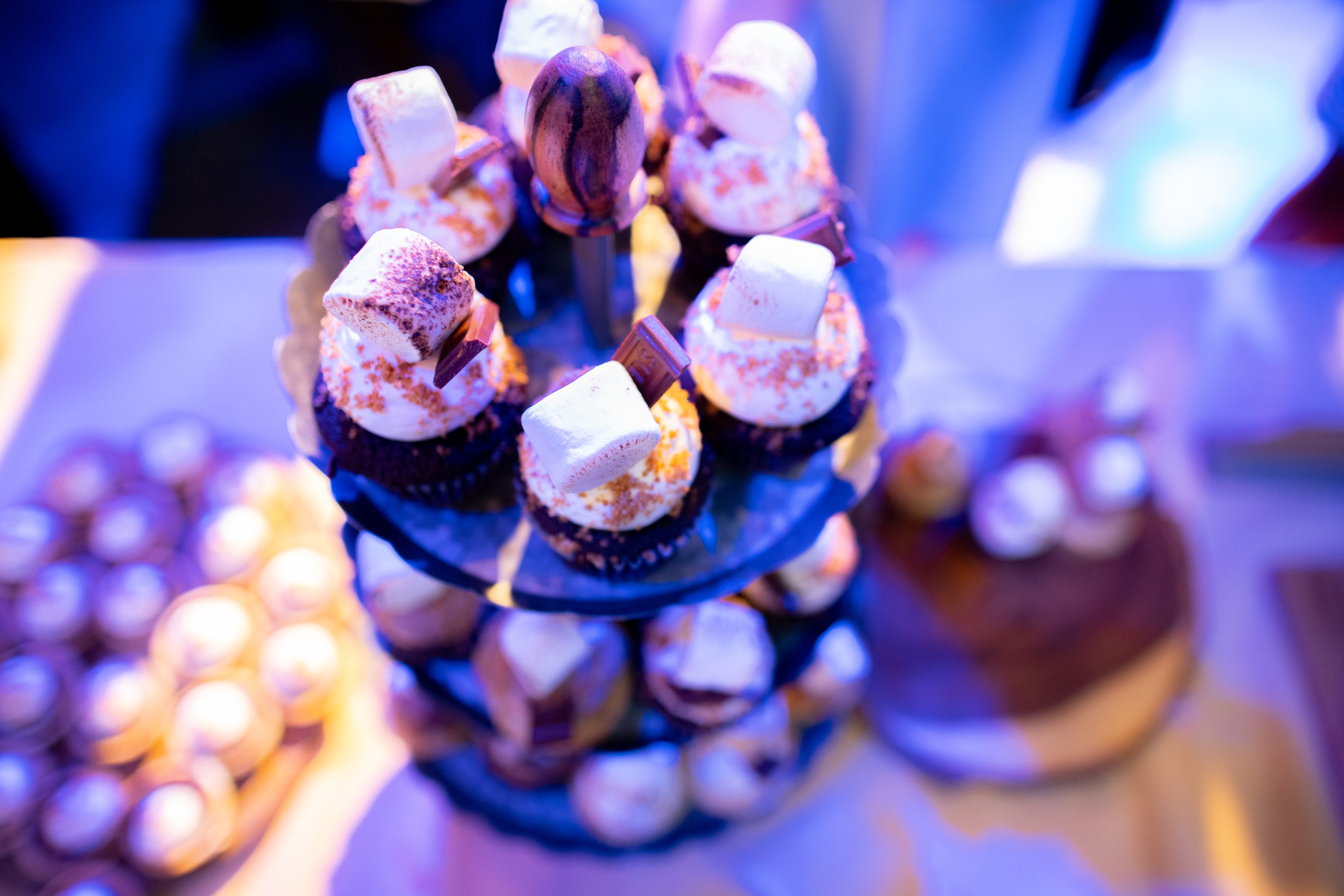 S'mores at Sydney’s lavender and teal Rustic Summer Camp themed Bat Mitzvah party at the Torpedo Factory, Alexandria, VA | Pop Color Events | Adding a Pop of Color to Bar & Bat Mitzvahs in DC, MD & VA | Photo by: Michael Temchine Photography