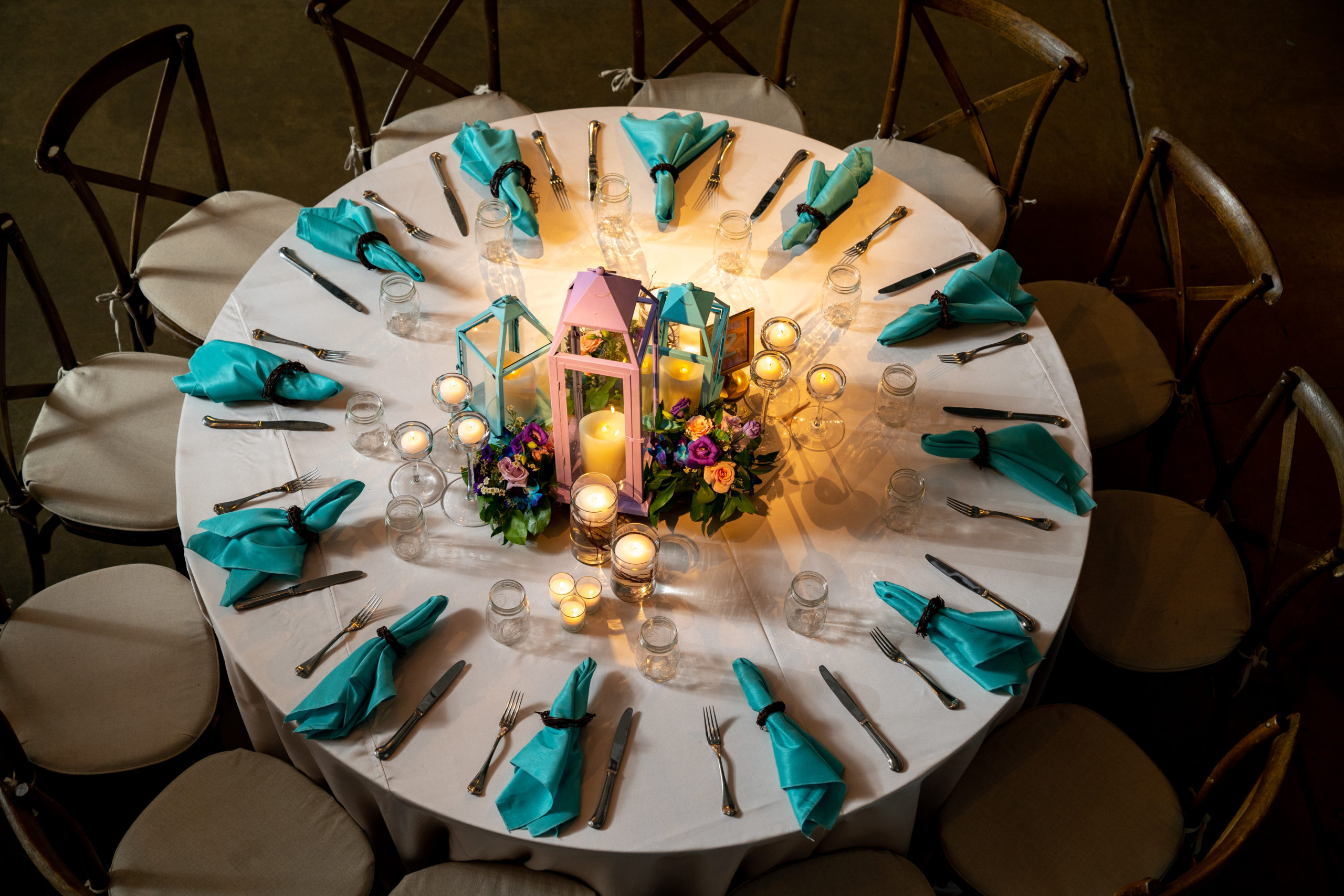 Centerpieces and tables at Sydney’s lavender and teal Rustic Summer Camp themed Bat Mitzvah party at the Torpedo Factory, Alexandria, VA | Pop Color Events | Adding a Pop of Color to Bar & Bat Mitzvahs in DC, MD & VA | Photo by: Michael Temchine Photography