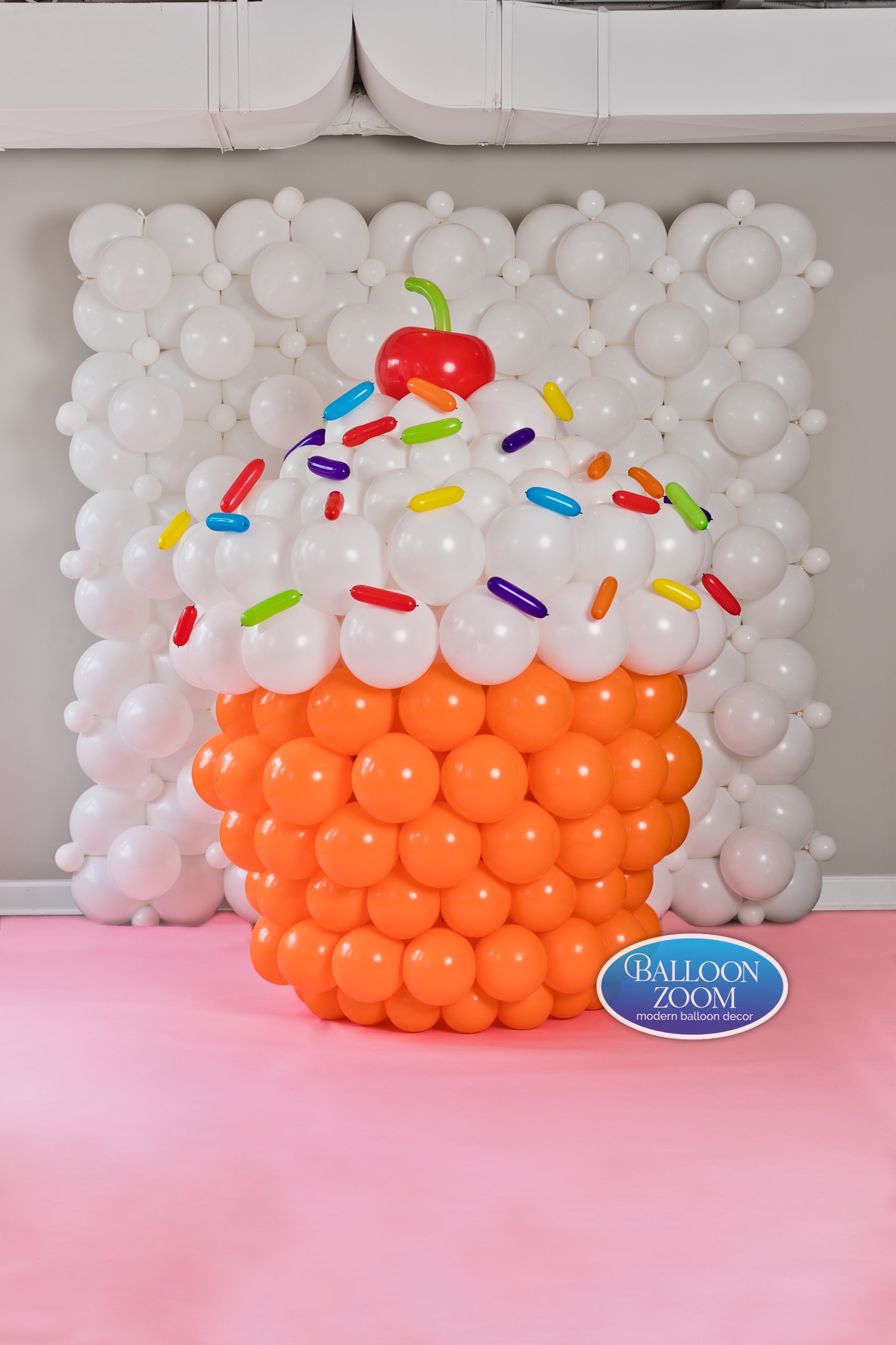 Colorful balloons shaped like a cupcake by Balloon Zoom | Pop Color Events | Adding a Pop of Color to Bar & Bat Mitzvahs in DC, MD & VA | Photo by: __name of photographer___
