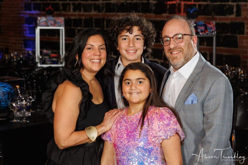 Lovely photo of Sebastian and his family at Sebastian's Graffiti and Sports Bar Mitzvah Party at Hook Hall in Washington, DC | Pop Color Events | Adding a Pop of Color to Bar & Bat Mitzvahs in DC, MD & VA | Photo by: Alison Tremblay Photography for Washington Talent