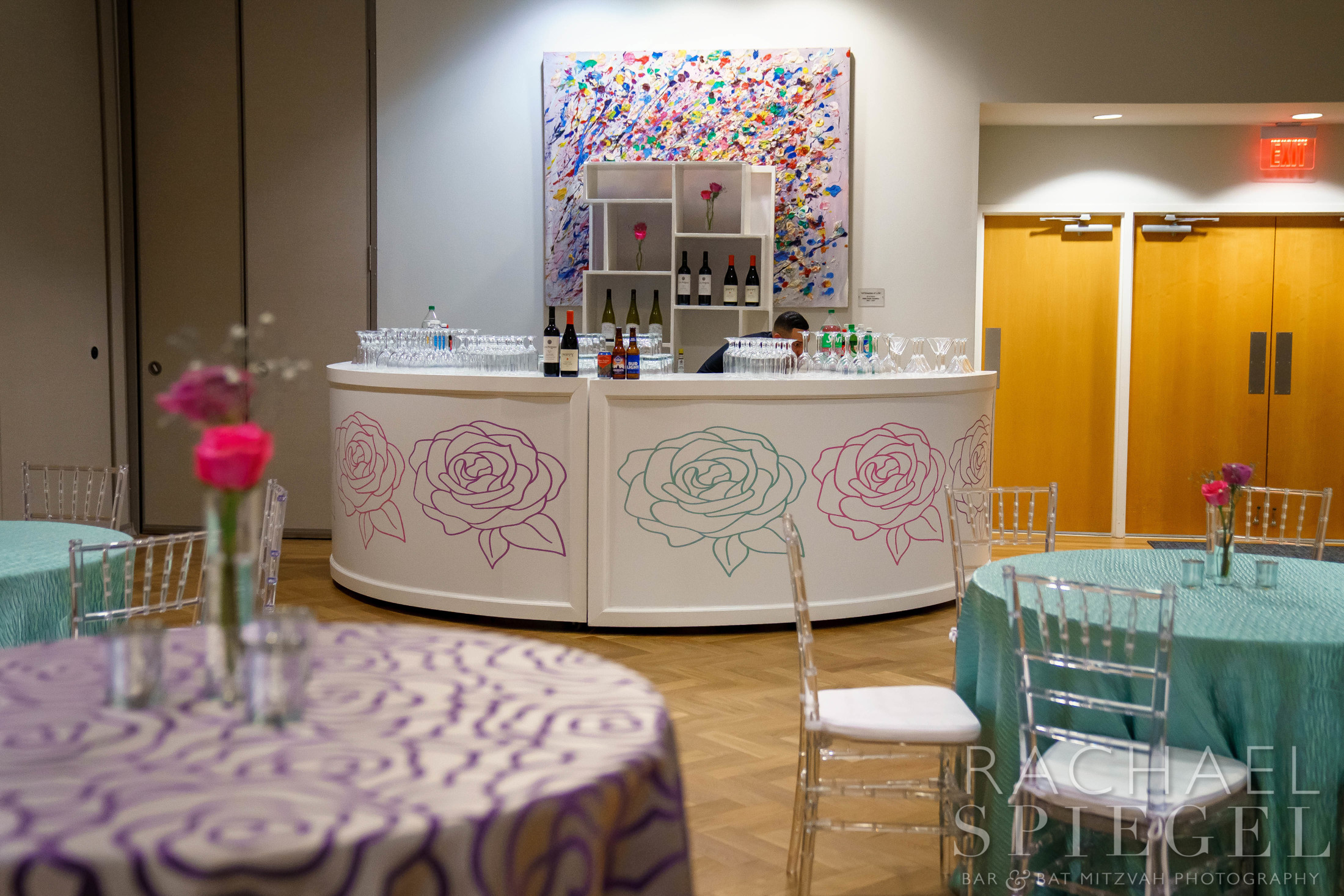 Naomi's custom curved bar at Naomi's Pink and Purple Floral Bat Mitzvah Party at Temple Sinai in Washington, DC | Pop Color Events | Adding a Pop of Color to Bar & Bat Mitzvahs in DC, MD & VA | Photo by: Rachael Spiegel Photography