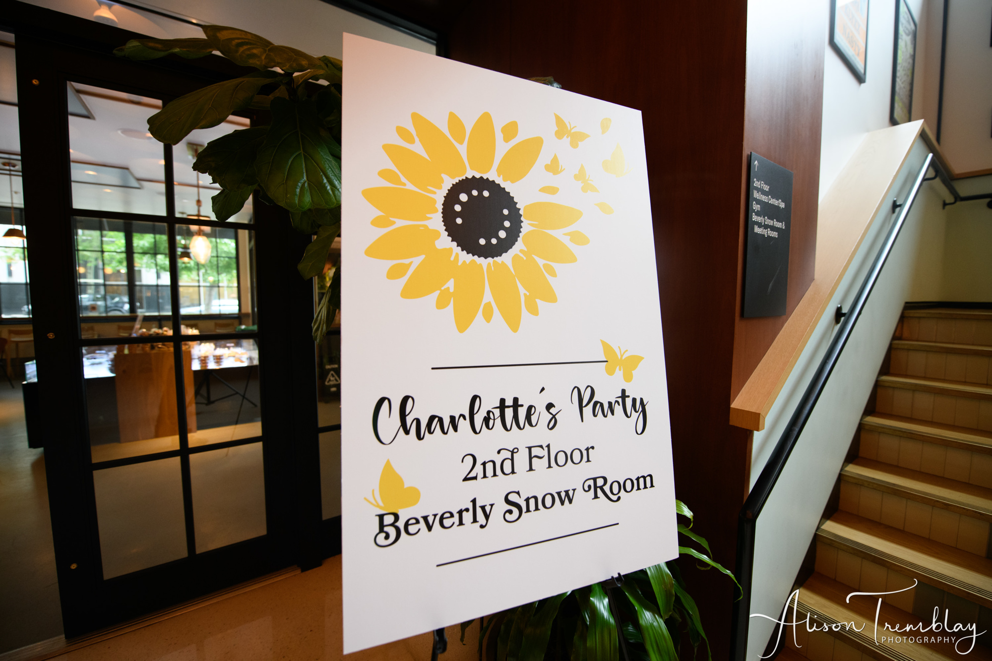 Charlotte's flowery signage at Charlotte's Sunflower and Butterfly Bat Mitzvah Party at Eaton In Washington, DC | Pop Color Events | Adding a Pop of Color to Bar & Bat Mitzvahs in DC, MD & VA | Photo by: Alison Tremblay