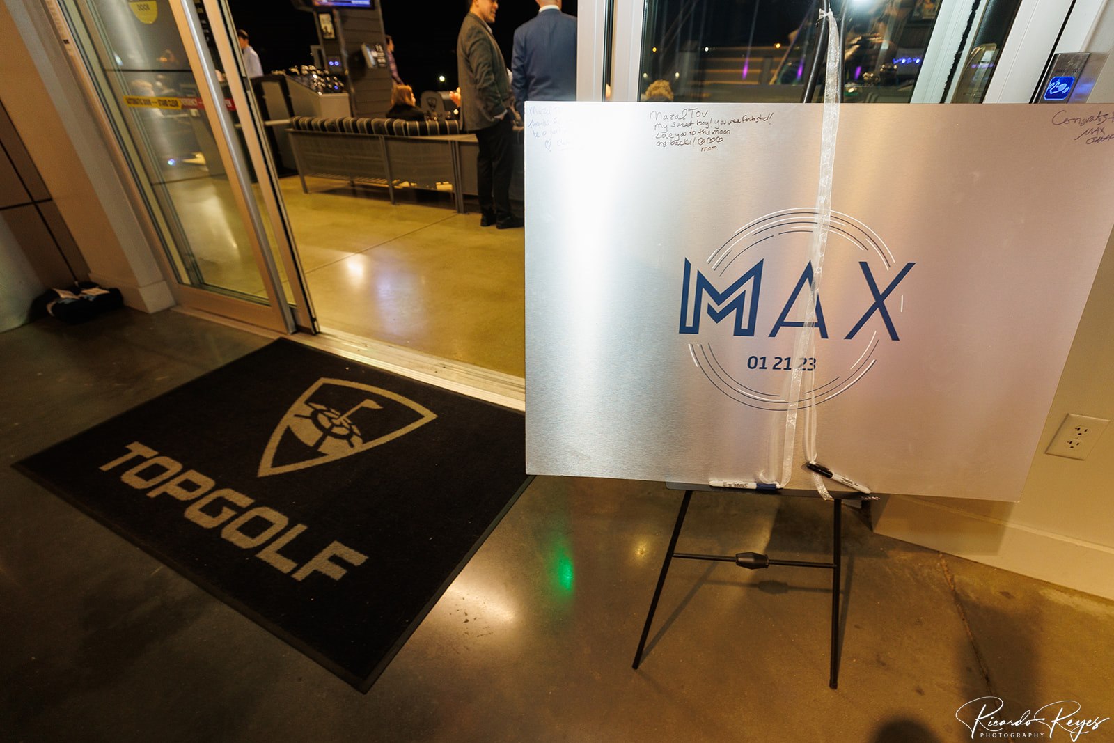 Max's silver signage with blue logo at Max's Sporty Bar Mitzvah Party at Top Golf in Germantown, MD | Pop Color Events | Adding a Pop of Color to Bar & Bat Mitzvahs in DC, MD & VA | Photo by: Chocolate fountain at Max's Sporty Bar Mitzvah Party at Top Golf in Germantown, MD | Pop Color Events | Adding a Pop of Color to Bar & Bat Mitzvahs in DC, MD & VA | Photo by: Ricardo Reyes Photography