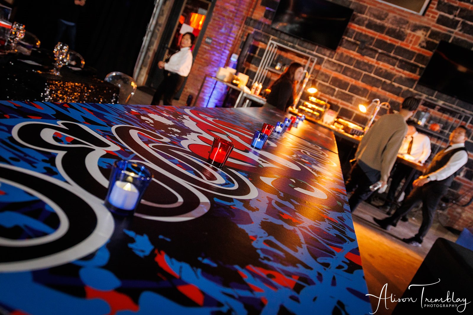 These custom tables were a perfect spot for the kids to sit at Sebastian's Graffiti and Sports Bar Mitzvah Party at Hook Hall in Washington, DC | Pop Color Events | Adding a Pop of Color to Bar & Bat Mitzvahs in DC, MD & VA | Photo by: Alison Tremblay