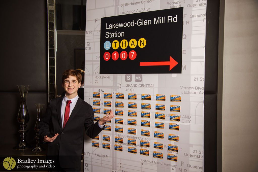 Escort card subway board at Ethan's New York City-Themed Bar Mitzvah Party at Lakewood Country Club | Pop Color Events | Adding a Pop of Color to Bar & Bat Mitzvahs in DC, MD & VA | Photo by: Bradley Images