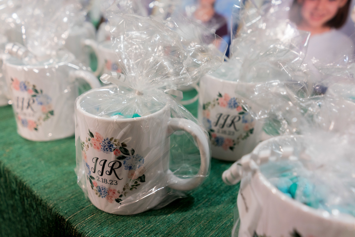 Mug favors at Juliana's Floral Bat Mitzvah Party at Agudas Achim in Alexandria, VA | Pop Color Events | Adding a Pop of Color to Bar & Bat Mitzvahs in DC, MD & VA | Photo by: Michael Temchine Photography