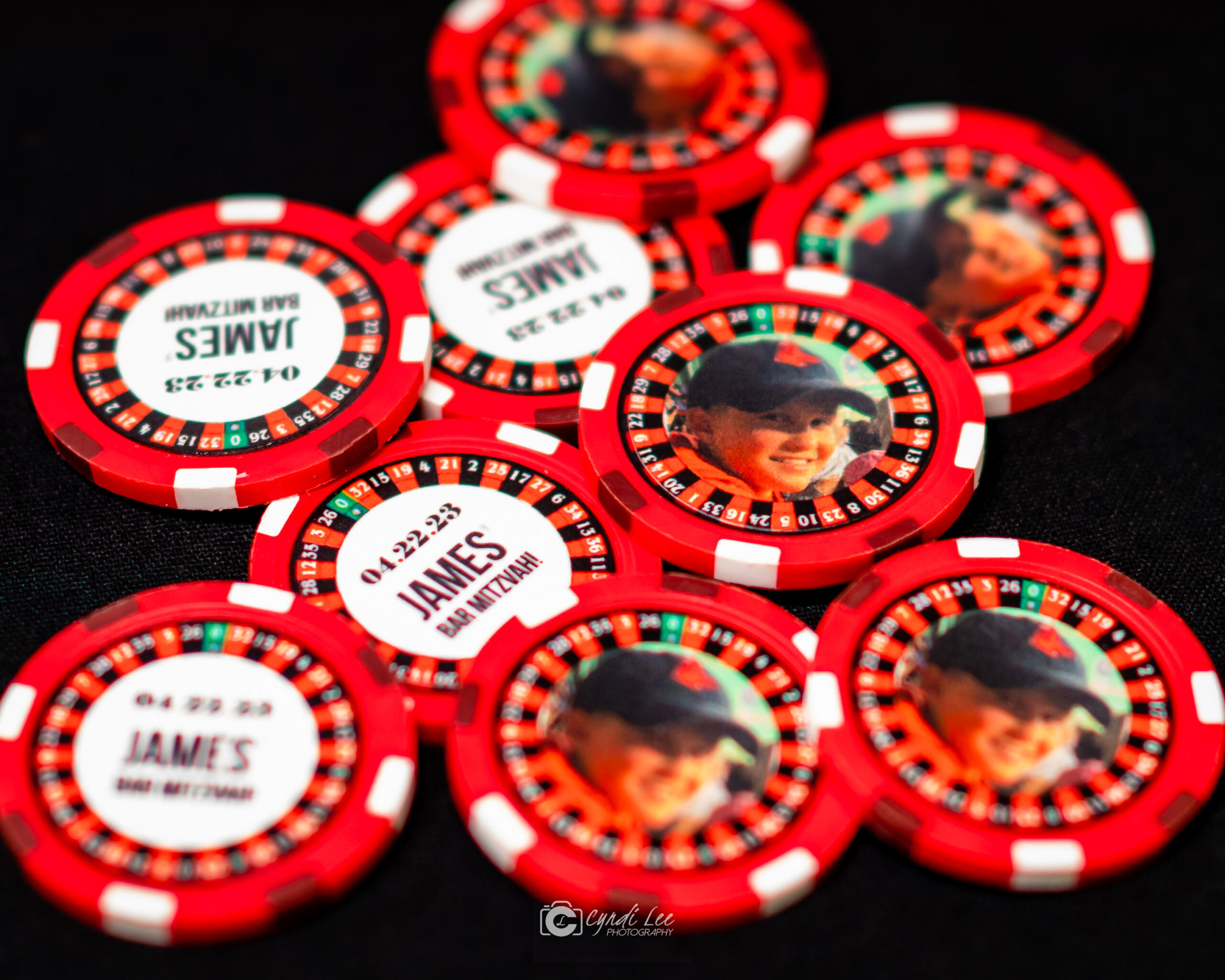 Custom poker chips at James's Electric Casino Bar Mitzvah Party at Temple Rodef Shalom in Falls Church, VA | Pop Color Events | Adding a Pop of Color to Bar & Bat Mitzvahs in DC, MD & VA | Photo by: Cyndi Lee Photography