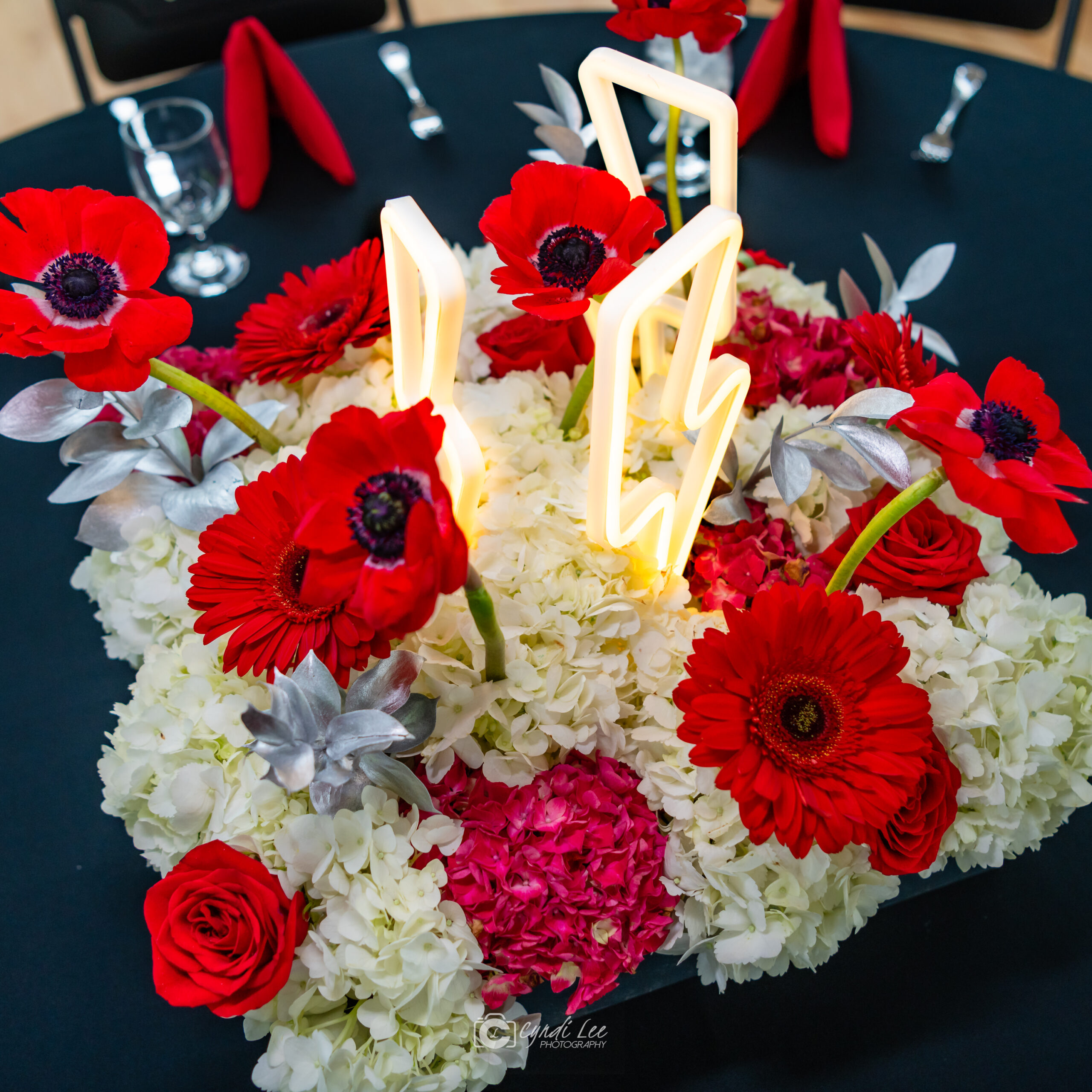 Centerpieces at James's Electric Casino Bar Mitzvah Party at Temple Rodef Shalom in Falls Church, VA | Pop Color Events | Adding a Pop of Color to Bar & Bat Mitzvahs in DC, MD & VA | Photo by: Cyndi Lee Photography