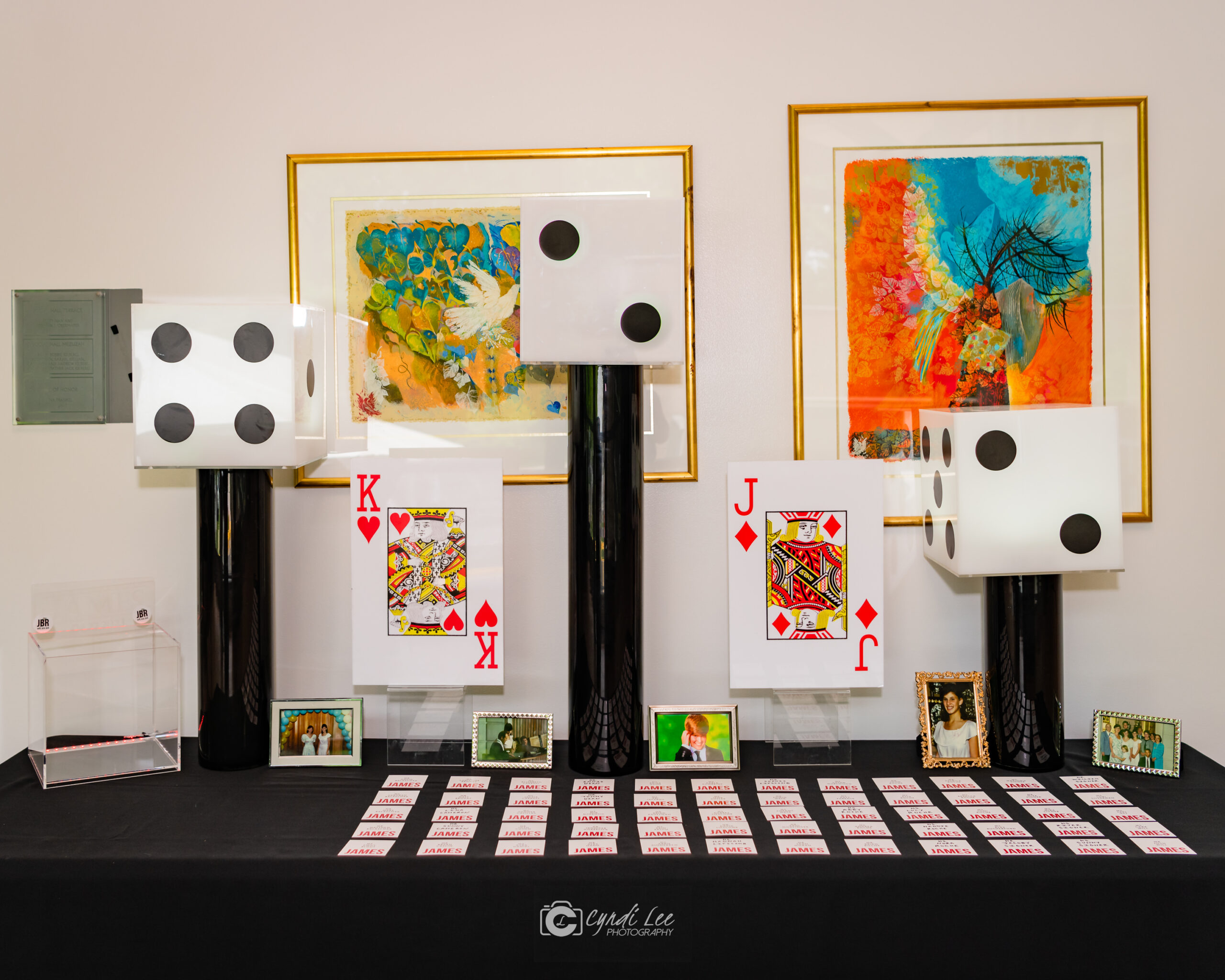 Escort card table at James's Electric Casino Bar Mitzvah Party at Temple Rodef Shalom in Falls Church, VA | Pop Color Events | Adding a Pop of Color to Bar & Bat Mitzvahs in DC, MD & VA | Photo by: Cyndi Lee Photography