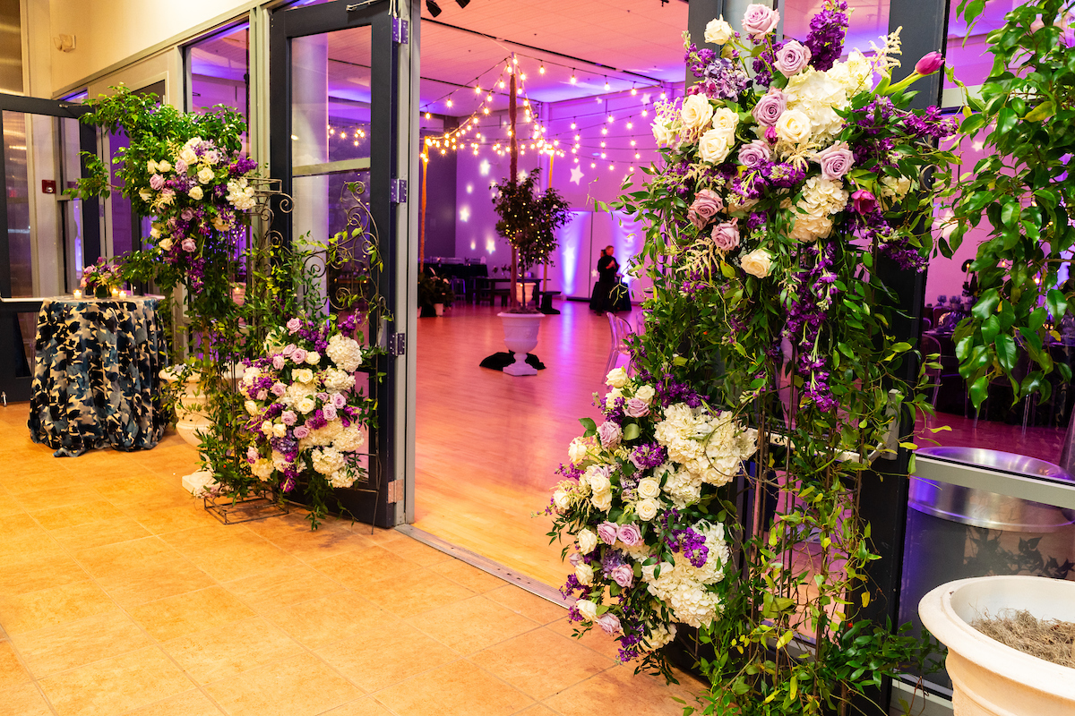 Entry moment at Jordan's Enchanted Garden Bat Mitzvah at Temple Rodef Shalom in Falls Church, VA | Pop Color Events | Adding a Pop of Color to Bar & Bat Mitzvahs in DC, MD & VA | Photo by: Michael Temchine Photography