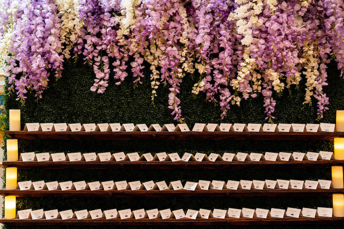 Escort card wall at Jordan's Enchanted Garden Bat Mitzvah at Temple Rodef Shalom in Falls Church, VA | Pop Color Events | Adding a Pop of Color to Bar & Bat Mitzvahs in DC, MD & VA | Photo by: Michael Temchine Photography
