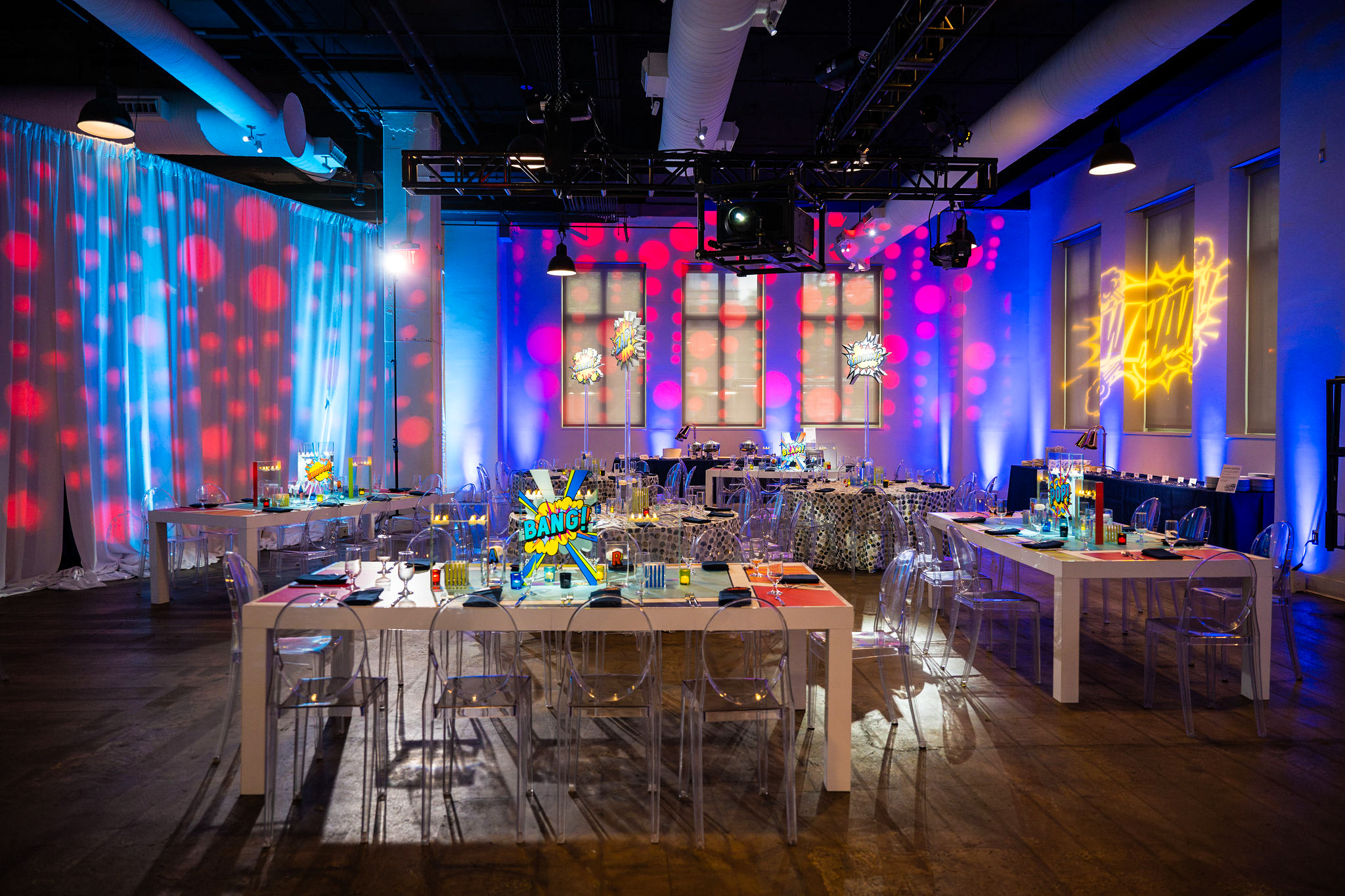 Guest tables at Rhys and Archer's Comic Book-themed Bar Mitzvah Party at Showroom DC | Pop Color Events | Adding a Pop of Color to Bar & Bat Mitzvahs in DC, MD & VA | Photo by: Lacey Ann Photography