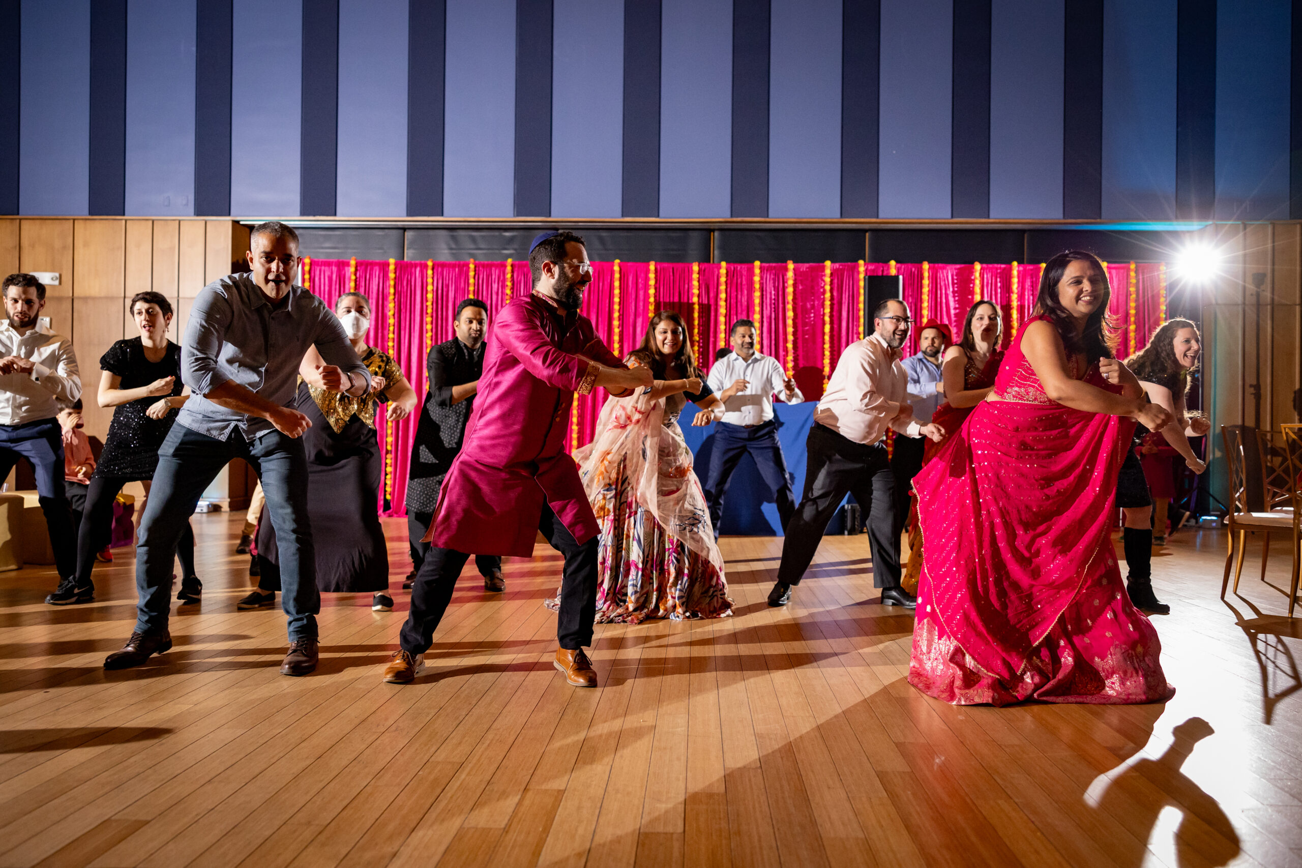 Dancing at Priya's Colorful Indian Fusion Bat Mitzvah Party at Silver Spring Civic Building | Pop Color Events | Adding a Pop of Color to Bar & Bat Mitzvahs in DC, MD & VA | Photo by: Jessica Latos Photography