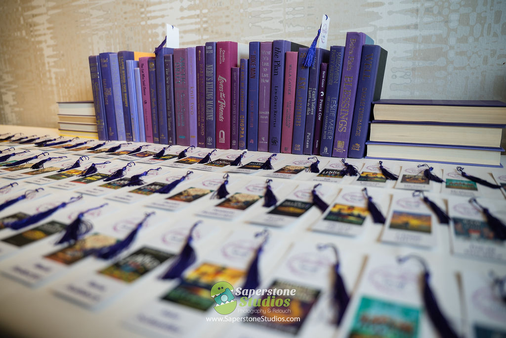 Bookmark seating cards at Sarah's purple Books and Balloons Bat Mitzvah at Westin Arlington Gateway | Pop Color Events | Adding a Pop of Color to Bar & Bat Mitzvahs in DC, MD & VA | Photo by: Saperstone Studios