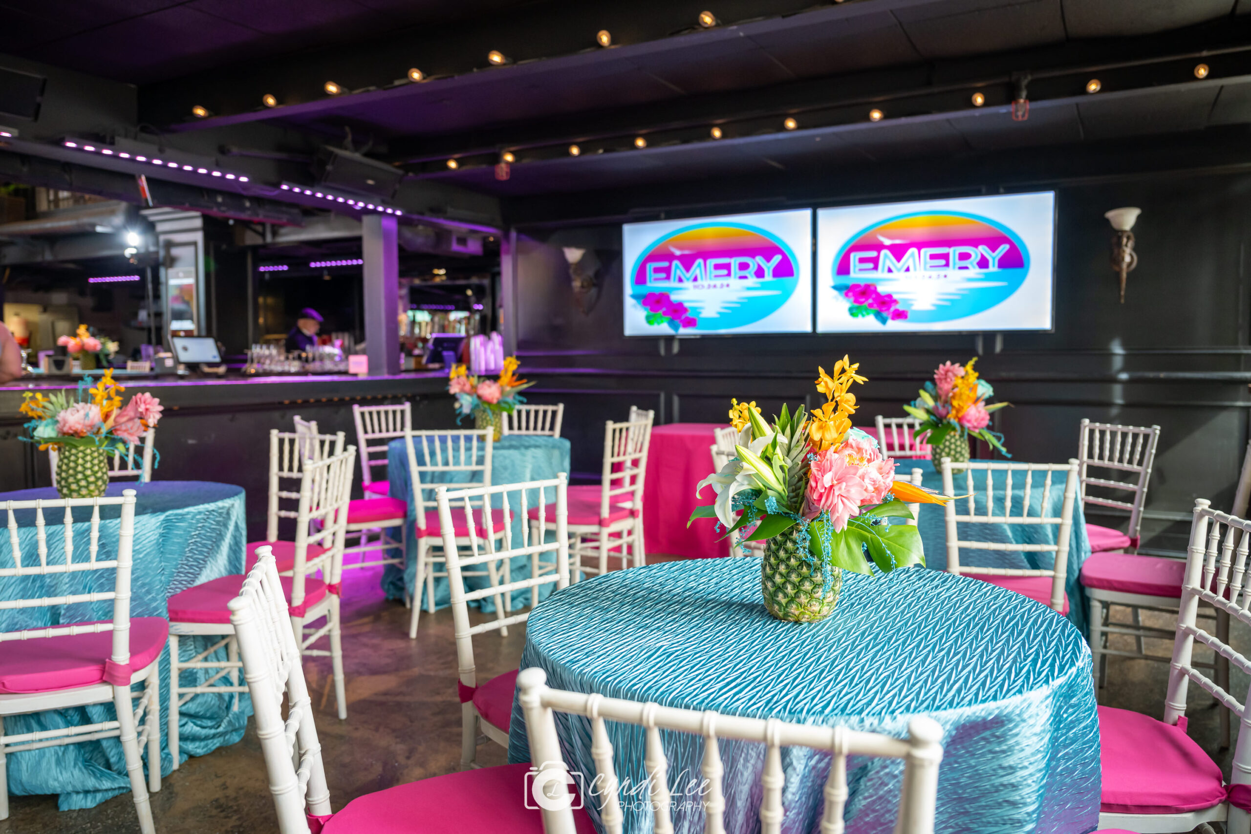 Floral centerpieces at Emery's Tropical Bat Mitzvah Party at The Renegade in Arlington, VA | Pop Color Events | Adding a Pop of Color to Bar & Bat Mitzvahs in DC, MD & VA | Photo by: Cyndi Lee Photography