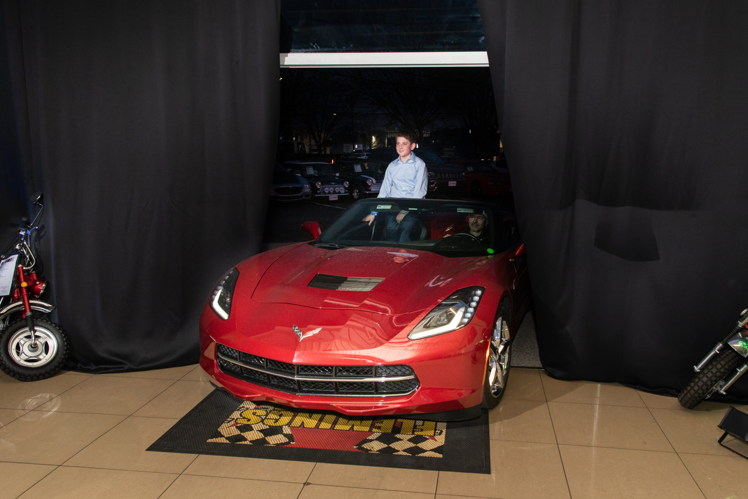 Grand Entrance at Noah's Car-Themed Bar Mitzvah Party at Rev Room | Pop Color Events | Adding a Pop of Color to Bar & Bat Mitzvahs in DC, MD & VA | Photo by: Greg Land